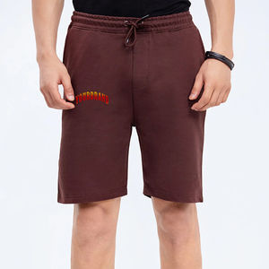 Pantalones cortos para hombre de color sólido, extragrandes, con bolsillos laterales y cordón interior, con logo impreso en DTF personalizado y diseño único. - Product Image 4