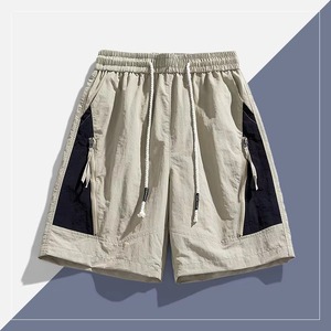 Shorts coupe-vent en polyamide personnalisés, légers, en nylon coloré, shorts d'été pour hommes - Product Image 4