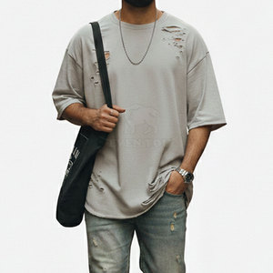 เสื้อยืดโอเวอร์ไซส์ลายกราฟิกสไตล์วินเทจ ผ้าฝ้ายพรีเมียมเนื้อนุ่ม สตรีทแวร์แฟชั่นสำหรับผู้ชาย ทันสมัย สวมใส่สบาย - Product Image 1