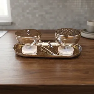 Ensemble de brûleurs d'encens luxueux en argent, surélevés par des bases élégantes en résine, accompagnés de couvercles en maille et d'une pince de service sur un plateau assorti. - Product Image 5