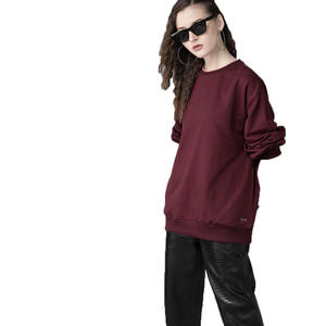 Conjunto deportivo de dos piezas de algodón personalizado al por mayor para mujer, con sudadera de cuello redondo y pantalones de chándal. - Product Image 1