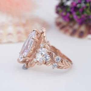Ensemble de bagues de fiançailles en argent sterling 925 avec moissanite taille marquise romantique et alliance plaquée or rose à motif de rose 3D - Product Image 2