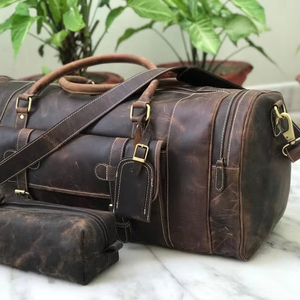 กระเป๋าเดินทางหนังแท้จากโรงงานผู้ผลิต น้ำหนักเบา พกพาสะดวก สไตล์เรโทร ขนาดใหญ่ จุของได้เยอะ ใช้เป็นกระเป๋าถือขึ้นเครื่องได้ - Product Image 1