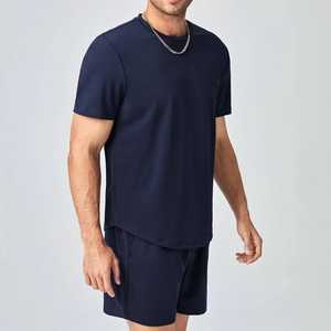 ชุดเสื้อยืดคอกลมสีกรมท่าและกางเกงขาสั้นสำหรับผู้ชาย ชุดลำลองใส่สบายระบายอากาศได้ดี เหมาะสำหรับฤดูร้อน ผ้าฝ้ายถักสีพื้น - Product Image 5