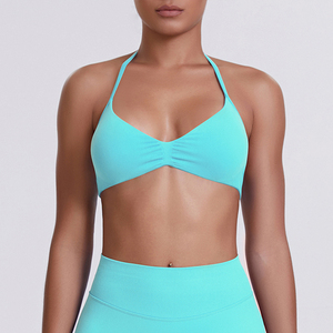Top sin costuras inalámbrico con cuello halter y triángulo en la espalda, color azul liso para mujer - Product Image 6