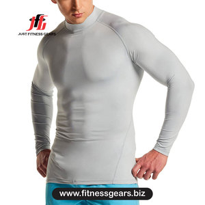 Rashguard à manches longues pour homme en Spandex/Nylon, écologique, séchage rapide, coupe sans couture, couleur et logo personnalisables - Product Image 1