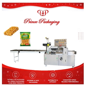Multi Function <b>Pillow</b> Packaging Automatic Feeding Snack Food Peanut Chikki Packing Machine Chocolate bar Packaging Machine - Product Image 1