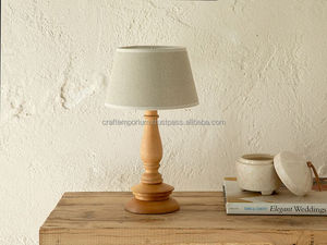 handcrafted table <b>lamps</b> made of carved wood with hand-polished surfaces and artistic lampshades for upscale interior lighting. - Product Image 3