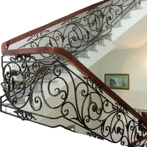 High quality wrought iron stair railing with artistic curves and powder coated finish, ensuring long lasting beauty!! - Product Image 1
