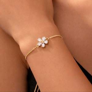 Hallmark Gold Plated <b>Silver</b> Flower <b>Charm</b> <b>Bracelet</b> for Women - Product Image 1