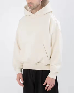 Sweat à capuche oversize pour homme avec cordon de serrage, capuche croisée, épaules tombantes, poche kangourou avant et poignets côtelés - Product Image 1