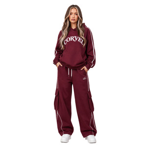 Ensemble de survêtement bleu pour femme avec sweat-shirt à poche et pantalon cargo large à empiècements, personnalisable avec logo, commande en gros - Product Image 5