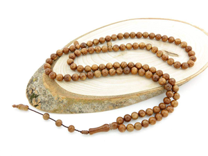 Tasbih de madera hecho a mano con cuentas equilibradas y cuerda resistente para un rendimiento duradero. - Product Image 4