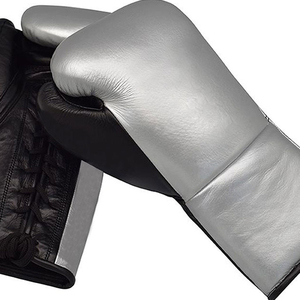 Protección adecuada para entrenamientos en el gimnasio, sesiones de fitness y artes marciales. Guantes de boxeo diseñados con acolchado de espuma gruesa para absorber impactos. - Product Image 2