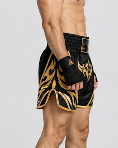Shorts de Muay Thai en satin noir et or, matériau durable, pour entraînement et compétition d'arts martiaux mixtes, équipement sportif combiné haut de gamme - Product Image 5
