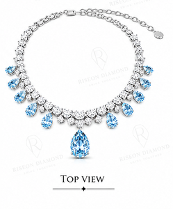Exquisite <b>necklace</b> in 18K white gold with oversized pear cut blue gemstone centerpiece surrounded by brilliant lab grown diamond - Product Image 6