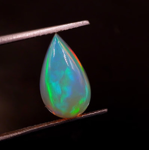 โอปอลเอธิโอเปียสีขาวธรรมชาติทรงลูกแพร์แบบคาโบชอง น้ำหนัก 2.00 กะรัต พร้อมสีเปลี่ยนแปลง - Product Image 4