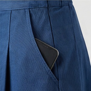 Jupe plissée mini pour femme, couleur unie, taille élastique, respirante, en polyester, à porter en toutes saisons - Product Image 5