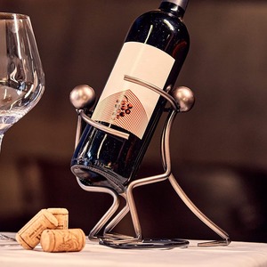 Porte-bouteille à vin en métal en forme de vague, présentoir à vin tendance et contemporain - Product Image 1