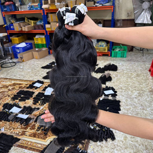 Perruques brésiliennes en cheveux humains vierges en gros, avec dentelle frontale, couleur et texture personnalisables, ondulations naturelles, pointes pleines - Product Image 3