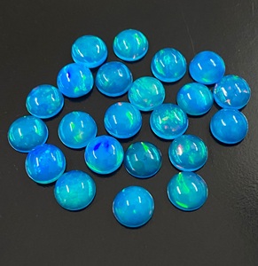 พลอยโอปอลสีน้ำเงินทรงกลมเจียระไนแบบบริลเลียนท์  ธรรมชาติ  มีการเปลี่ยนสี  สำหรับทำเครื่องประดับ  ขัดเงาแล้ว  จากราชสถาน - Product Image 2