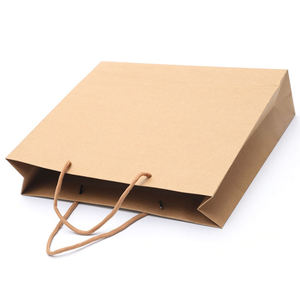 Bolsas de compras de papel kraft personalizadas con asas, ecológicas y duraderas, ideales para comercio minorista y embalaje. - Product Image 1