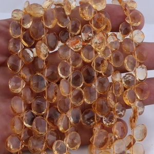 ลูกปัดรูปหัวใจสีเหลืองเหลี่ยมเพชรพลอย10-12มม. เส้นใย8นิ้วสำหรับทำเครื่องประดับลูกปัดหินสีเข้มเข้ม - Product Image 1