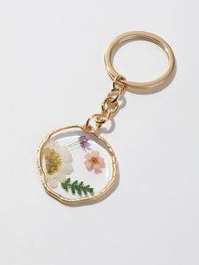Elegant Resin Key Ring Featuring Glitter Handmade Winter Holiday Decorative Keepsake Accessory Gift - Product Image 1