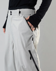 Pantalon de ski imperméable coupe ample, coupe-vent et thermique avec jupe de protection pour sports d'hiver en extérieur - Product Image 2