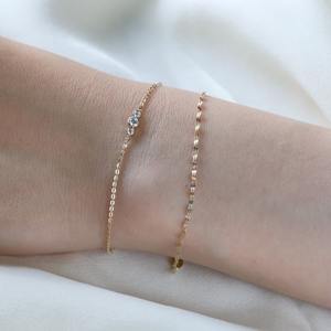 กำไลข้อมือทองคำแท้ประดับเพชรโมอิสซาไนต์และเพชรเลี้ยงในห้องปฏิบัติการแบบสามเม็ด ดีไซน์เรียบหรู ได้รับการรับรองจาก IGI ทอง 14K/18K ของขวัญสำหรับผู้หญิง - Product Image 3