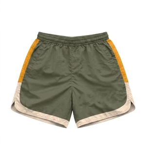 Short coupe-vent en nylon Taslon 120 GSM de qualité supérieure, vert olive avec empiècements latéraux jaunes, logo personnalisé, nylon teint uni - Product Image 1