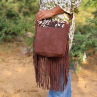 Cheveux sur le rabat en cuir véritable Style occidental nouveau sac à franges de créateur sac à bandoulière bohème femmes multi-usages sac à bandoulière
