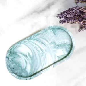 Plateau de toilette ovale transparent en résine à motif tourbillonnant pour la vente, idéal pour les accessoires d'hôtel ou les bijoux - Product Image 1