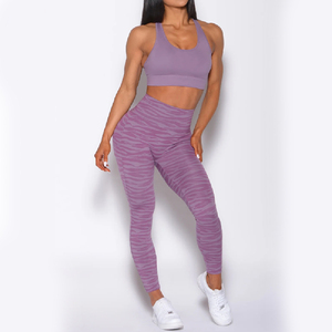 Conjunto de leggings y sujetador deportivo para mujer, morado, liso, transpirable, con espalda cruzada y aberturas, de soporte medio, para yoga y ropa deportiva. - Product Image 1