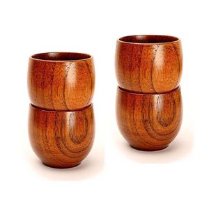 Elegantes tazas de madera natural diseñadas para un agarre cómodo, resistentes al calor y con una estética atemporal para la mesa de cocina. - Product Image 1