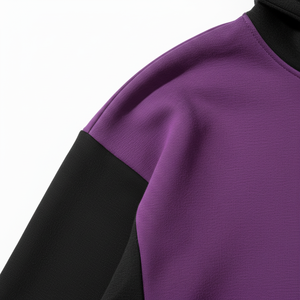 Conjunto deportivo de dos tonos morado y negro para hombre, con sudadera holgada y pantalones jogger, estilo casual urbano. - Product Image 2