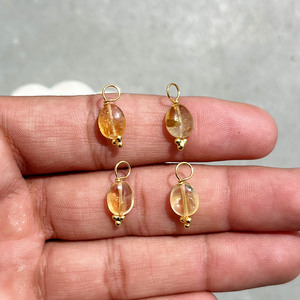 เสน่ห์ของซิทรินที่เรียบเนียน |   หินสีเหลืองธรรมชาติทรงกลม |   เครื่องประดับลวดทองหุ้มทองคำ - Product Image 1