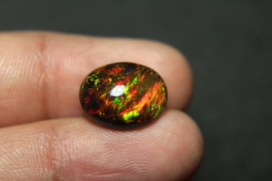 Ópalo negro etíope genuino de 14x11.5x6.5mm, piedra preciosa de 5 quilates, cabujón de ópalo natural multicolor de fuego, corte ovalado, piedra suelta para joyería. - Product Image 3