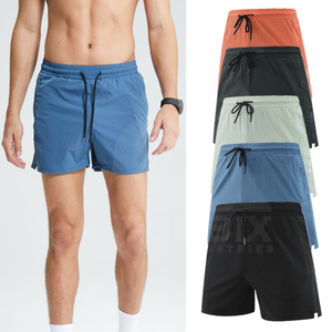 Shorts de sport bleus pour hommes, séchage rapide, avec poches, taille élastique, mi-longs, légers, extensibles, pour la course à pied et le fitness - Product Image 4