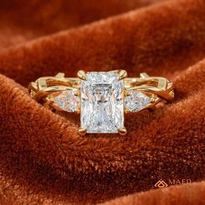 Luxury 14K Gold Radiant Shape Diamond Wedding <b>Ring</b> with Leaf Inspired Side Stones and Modern <b>Open</b> Band Design for Women - Product Image 1