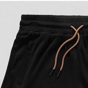 Shorts tricotés noirs unis pour hommes, taille mi-haute élastique, séchage rapide, style urbain, 100 % coton, pour garçons - Product Image 2