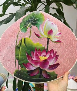 Vietnamese Folk Hat Natural Palm Leaf Traditional Conical Design Handwoven for Outdoor Use Travel and Cultural Decor - Product Image 6