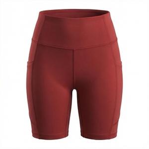 Shorts de yoga taille haute couleur unie avec poches, extensibles dans quatre directions, design sans couture pour femme, vêtements de sport - Product Image 2