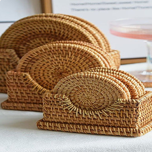 Handwoven round natural rattan <b>drink</b> <b>coasters</b> stacked inside matching woven wicker storage holders, available at wholesale price - Product Image 1