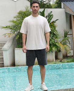 เสื้อยืดโอเวอร์ไซส์ผู้ชาย ผ้าฝ้ายทรงหลวม สไตล์วินเทจ ลุคย้อนยุค เสื้อยืดแขนสั้นลำลอง ใส่ได้ทั้งชายและหญิง - Product Image 6