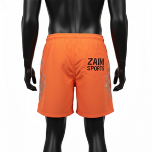 Pantalones cortos premium de nailon de secado rápido de 220 GSM para hombre, color naranja brillante, con logotipo de diamantes de imitación termotransferibles y parche personalizado. - Product Image 2