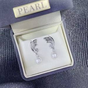 Boucles d'oreilles pendantes exquises à motif d'oiseaux jumeaux, asymétriques, brossées, en argent pur S925, ailes d'ange élégantes - Product Image 1