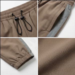 กางเกงวิ่งออกกำลังกายผ้าไนลอนสำหรับผู้ชายกางเกงใส่ทำงานกันน้ำแฟชั่นตามสั่งกางเกงฤดูหนาว - Product Image 4