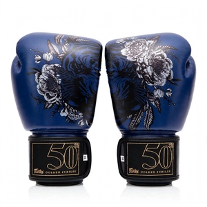 Nouveaux gants de boxe Fairtex en cuir bleu, modèle dernier cri, avec fermeture auto-agrippante et sangles réglables pour le kick-boxing et les arts martiaux. - Product Image 1