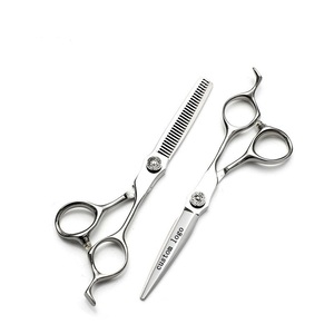 Ensemble de ciseaux à cheveux pour barbier ANAAIF, en acier inoxydable japonais personnalisé, à pointe arrondie, avec manche en céramique, pour droitiers - Product Image 1